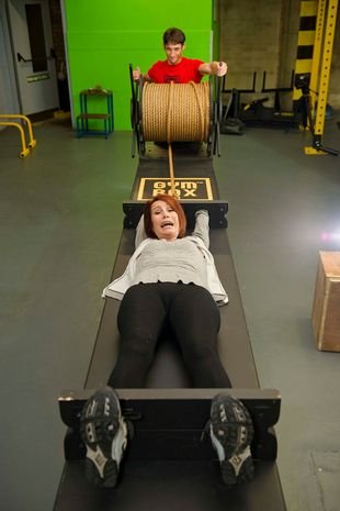 Polly Hudson tries out some of the exercises to grow taller.jpeg